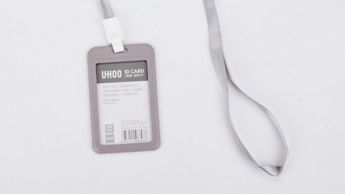 A blank identification card attached to a lanyard