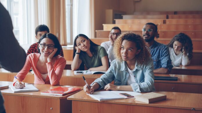 Students listening attentively in a lecture hall
